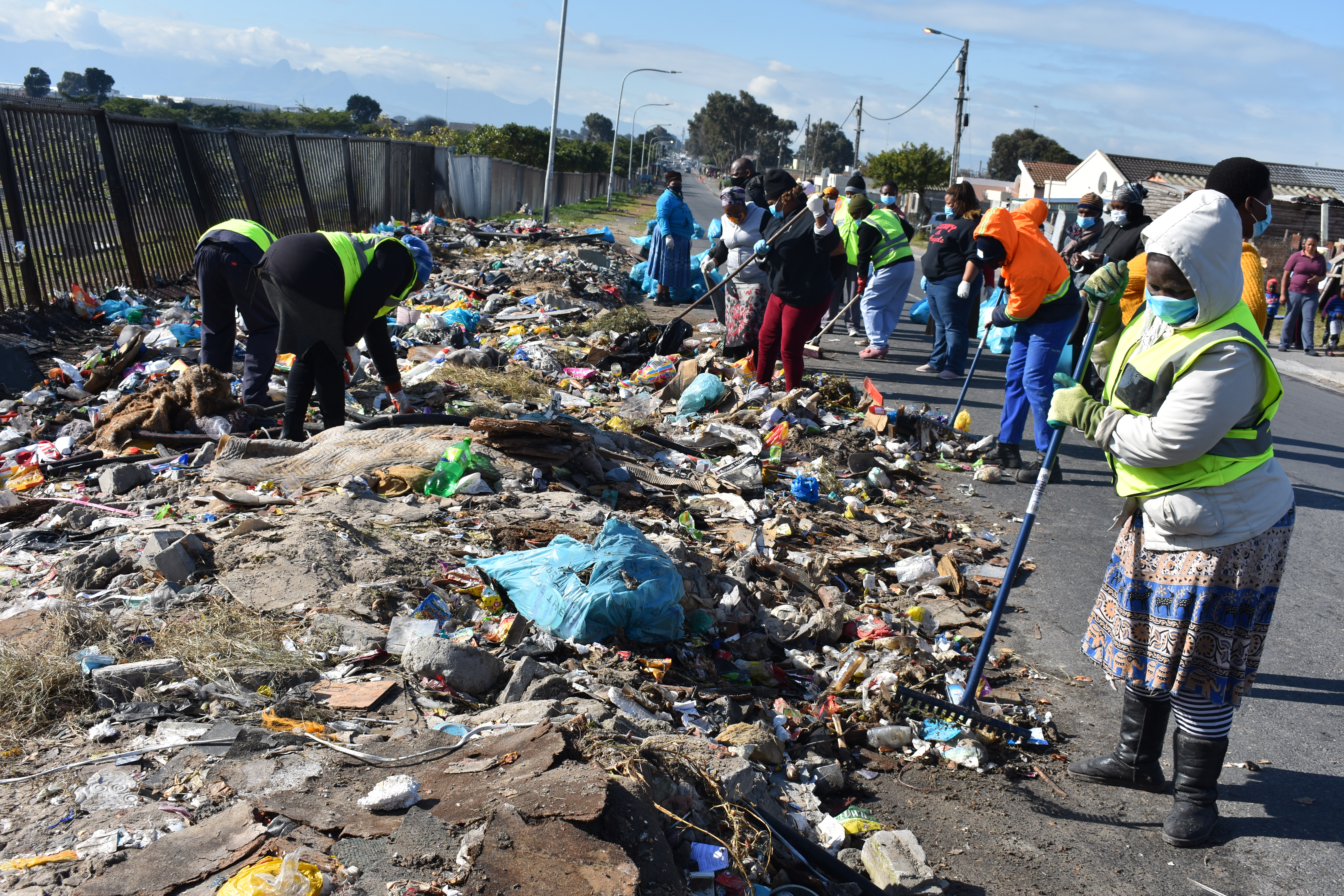 fed-up-with-piles-of-rubbish-residents-clear-their-own-streets-groundup
